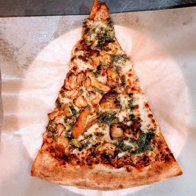 Chicken Pesto Pizza Slice.