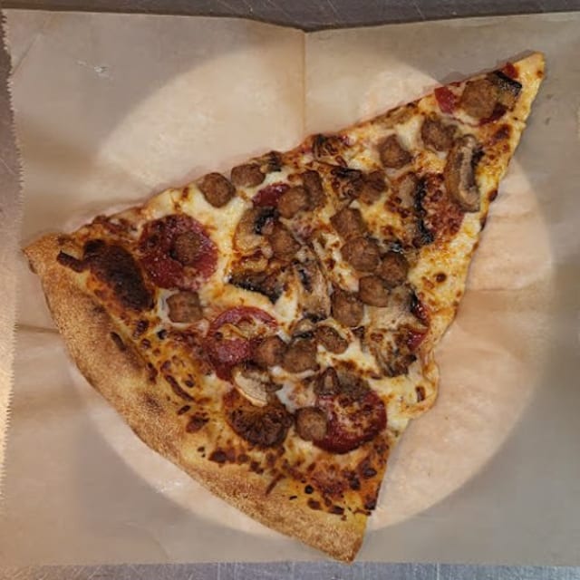 Meat Combo Pizza Slice.